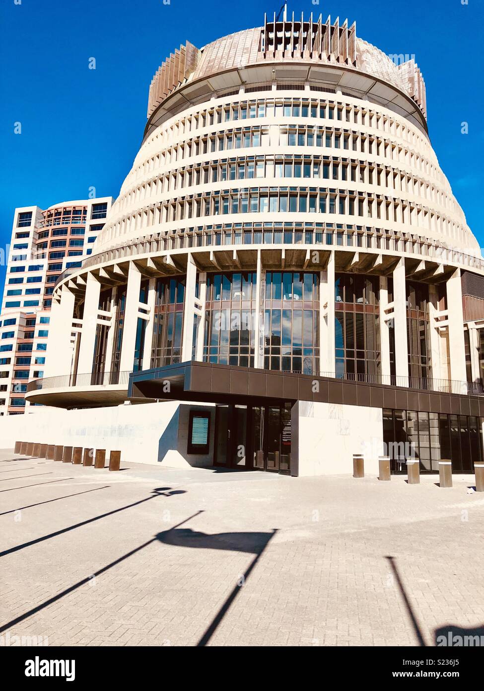 Beehive, Home of the Executive of the New Zealand Parliament,and Bowen House left, Wellington, North Island Stock Photo