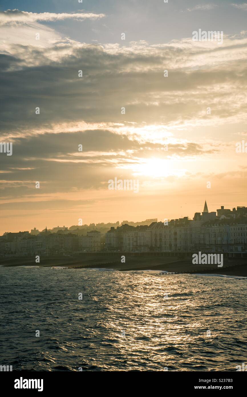 Sunset over town Stock Photo - Alamy