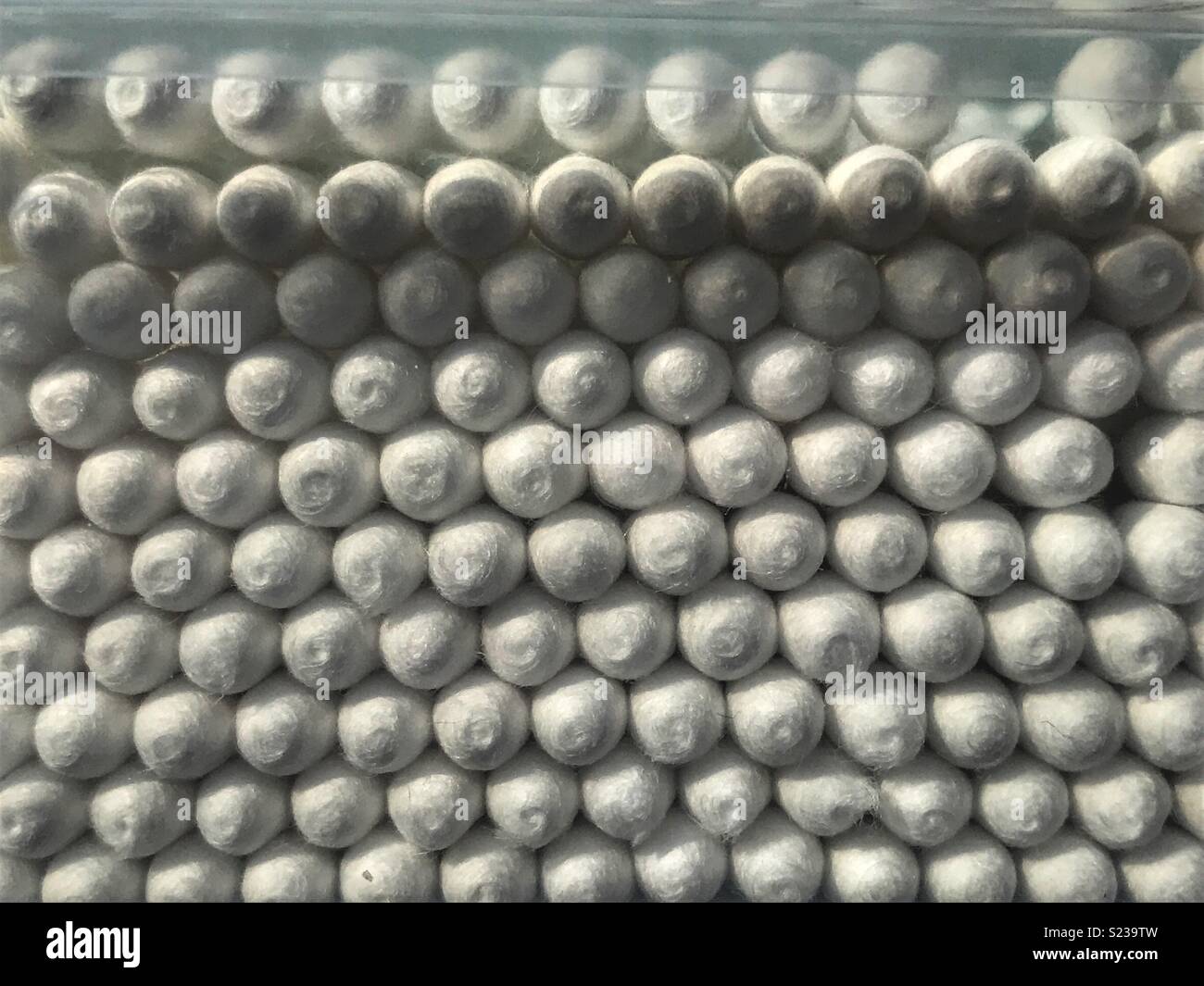 Taking steps to control plastic pollution, paper stemmed cotton buds, packaged for sale in a plastic box - Smartphone Captured Stock Image