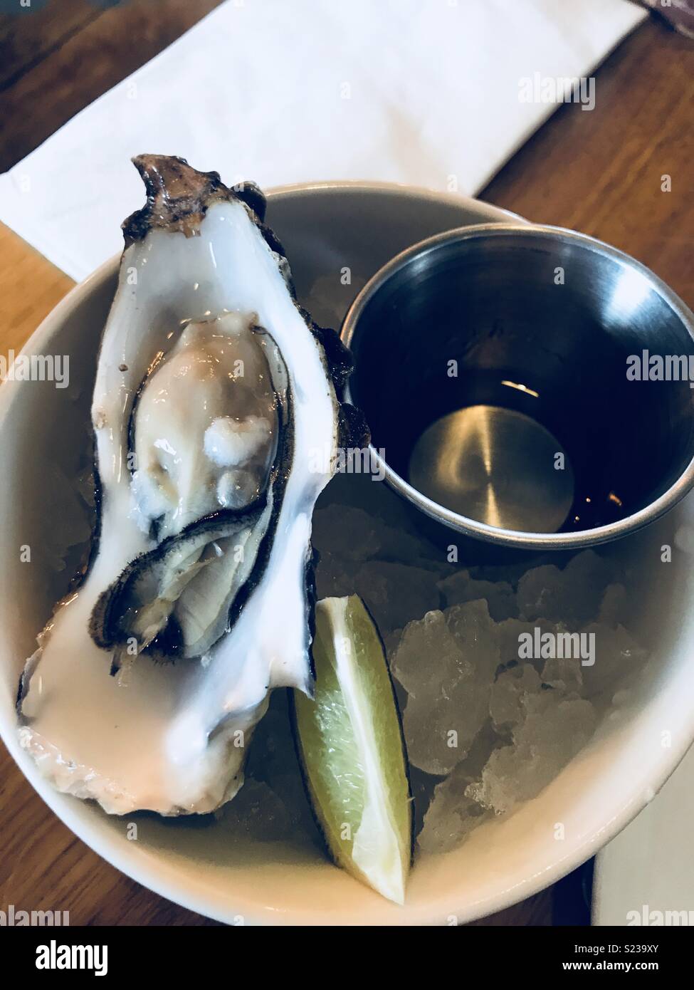Oyster with tequila shot in restaurant Stock Photo Alamy