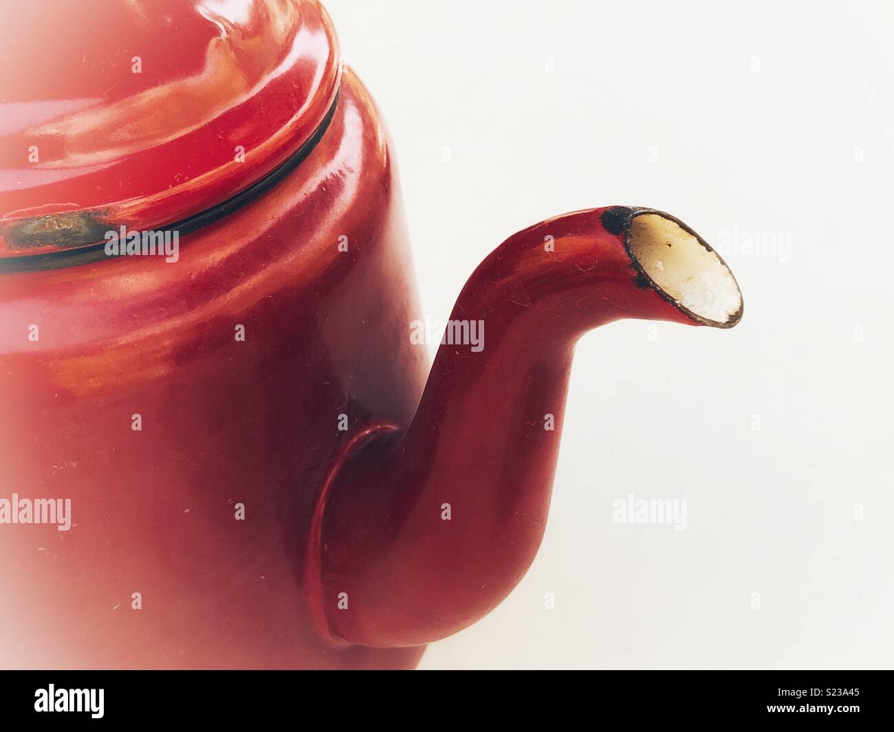 Rustic red tin teapot - Smartphone Captured Stock Image