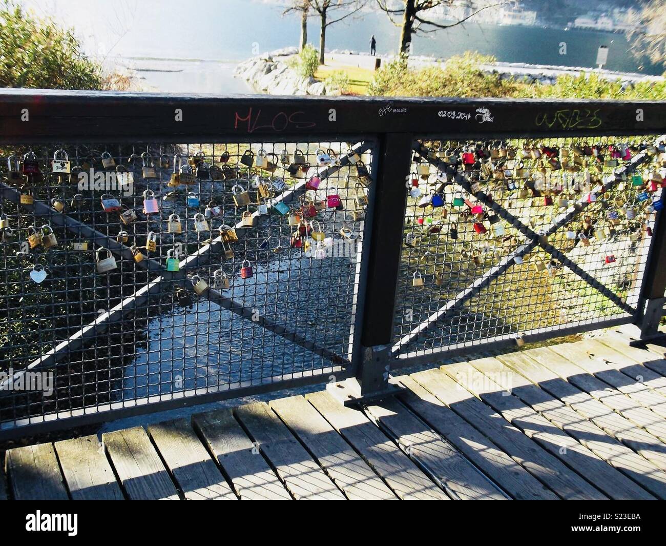 Love locks on a bridge in Riva del Garda, Italy. - Smartphone Captured Stock Image