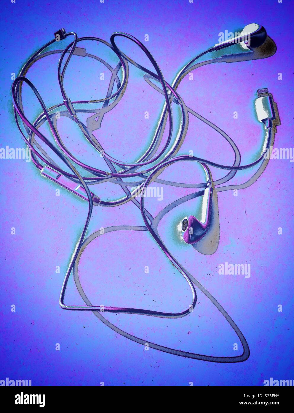 Tangled up headphones for iPhone Stock Photo
