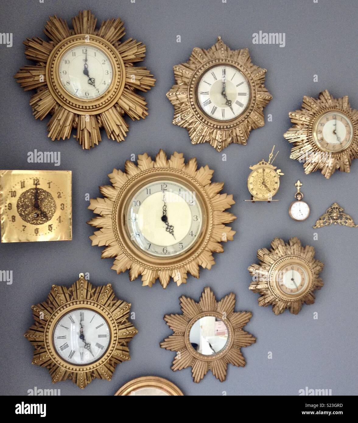 Gold clocks Stock Photo