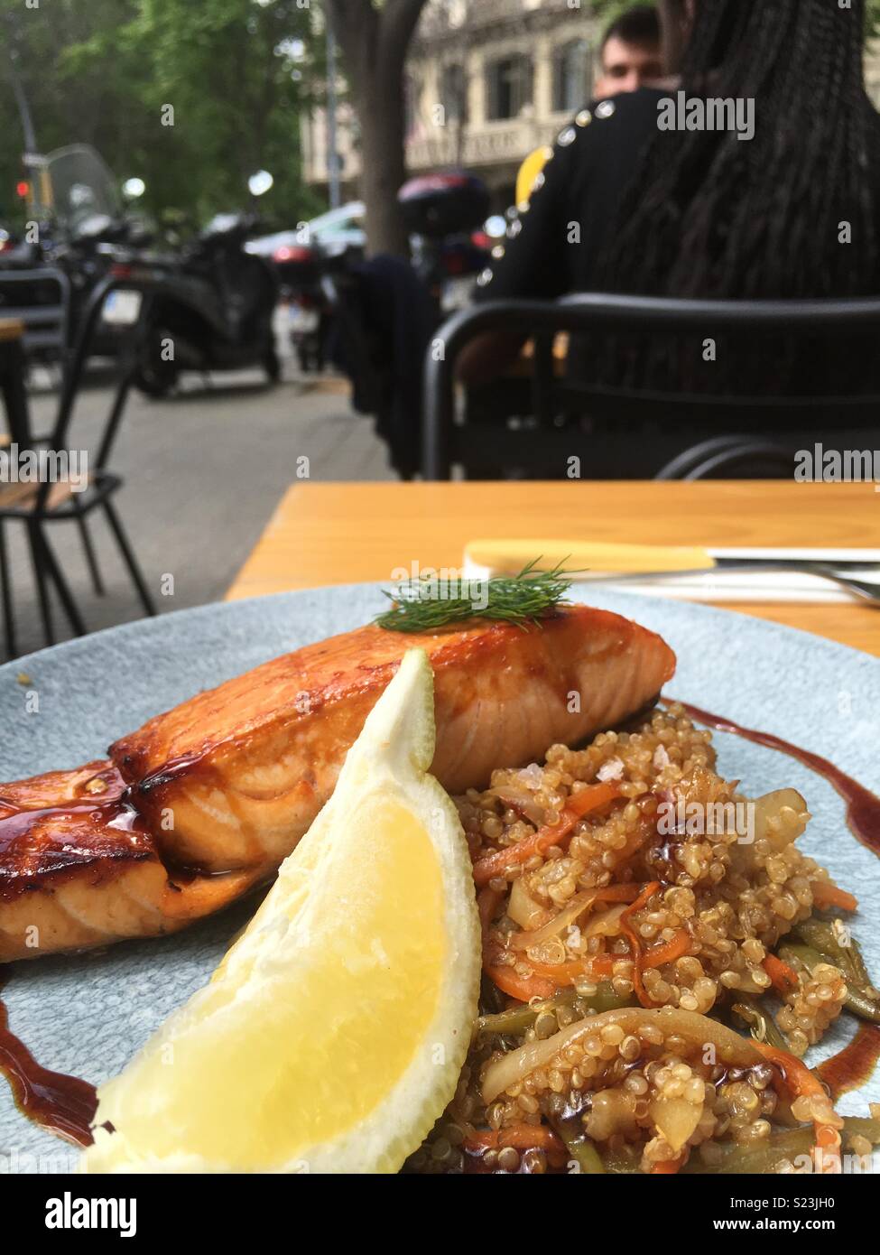 A plate of salmon teriyaki with cous cous Stock Photo