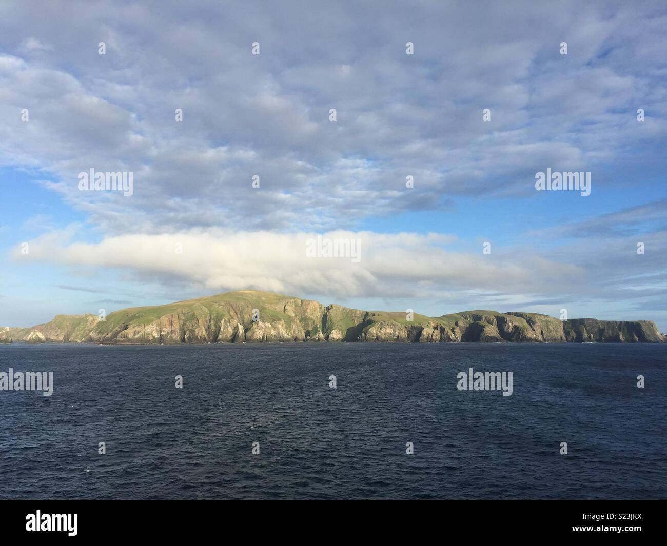 Fair Isle, Scotland, the UK’s most remote inhabited island, seen from the ferry heading from Shetland to Aberdeen. Stock Photo