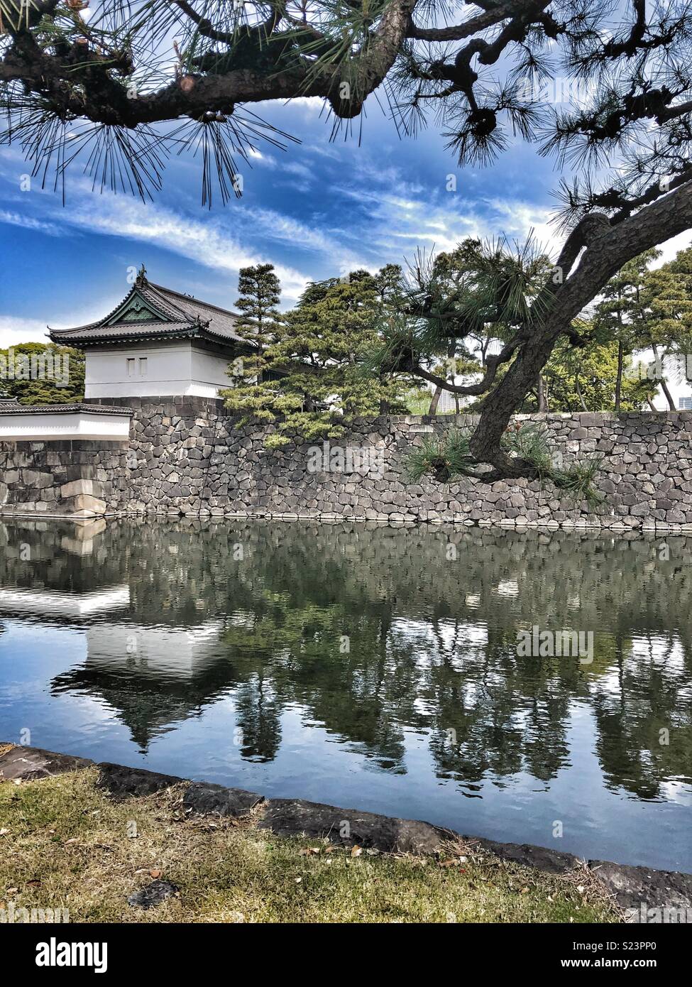 Stone wall and moat around the Imperial Palace in Tokyo. - Smartphone Captured Stock Image