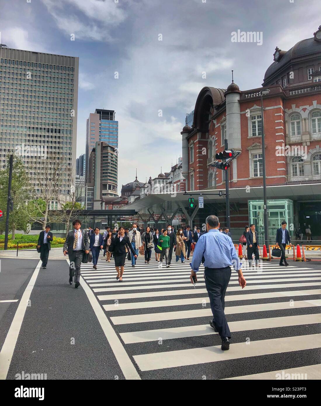 People crossing the street in Tokyo. - Smartphone Captured Stock Image