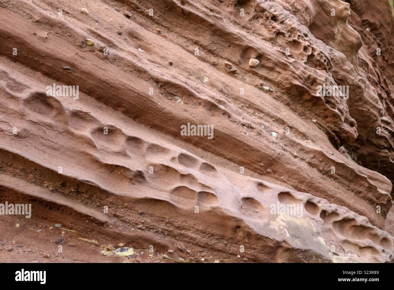 Eroded sandstone rock face. Stock Photo