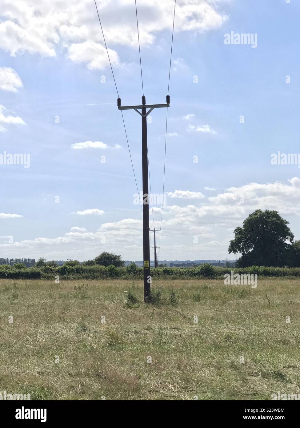 Pylon in field. Stock Photo