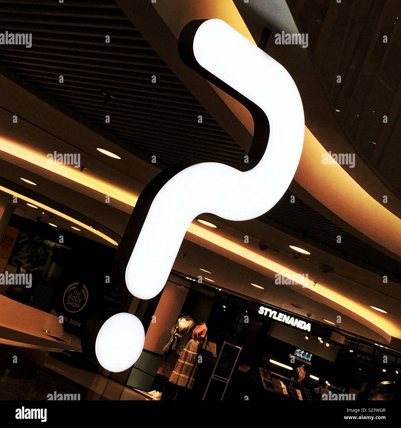 The illuminated sign for the information desk at the MOKO shopping mall in Grand Century Place, Mong Kok, Kowloon, Hong Kong - Smartphone Captured Stock Image