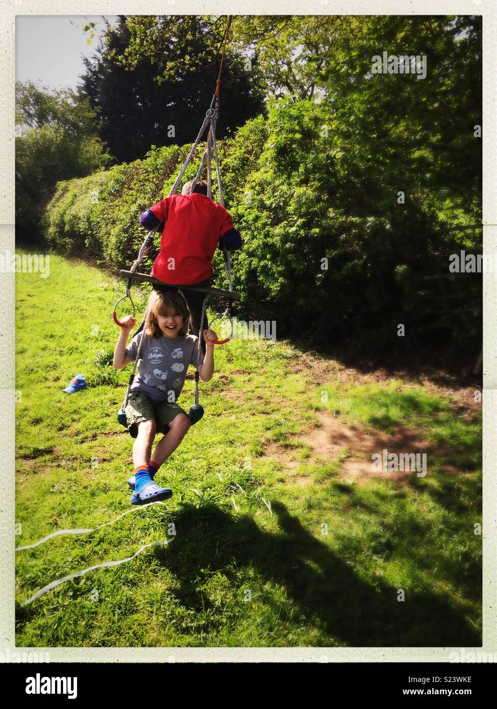 Family rope swing hires stock photography and images Alamy
