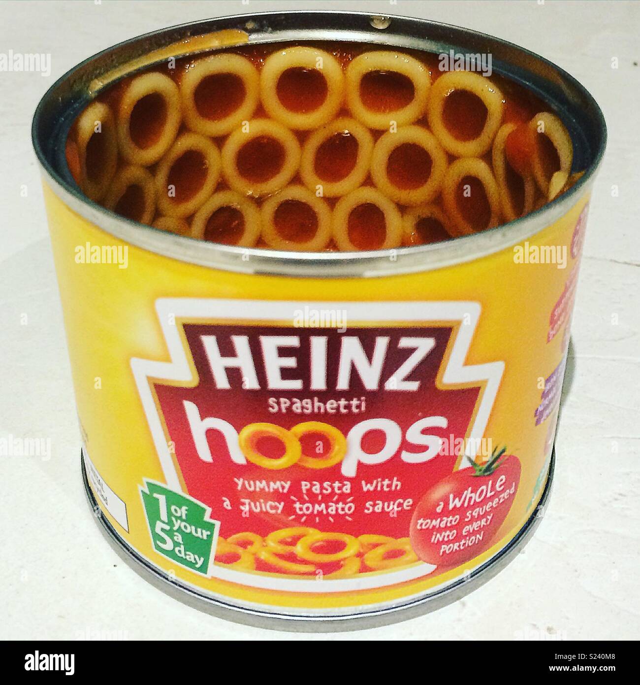 Heinz spaghetti hoops stuck to the side Stock Photo
