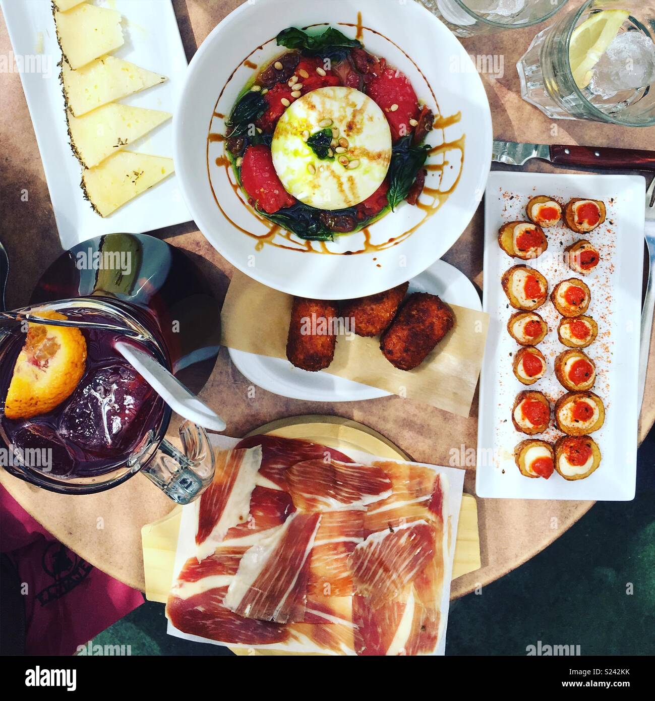 Fiesta in Madrid sangria, ham, croquettes, manchego, buratta and