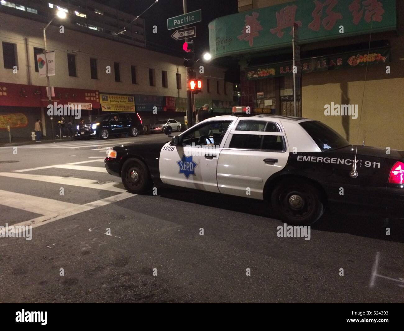 San Francisco cop car driving along Pacific avenue Stock Photo