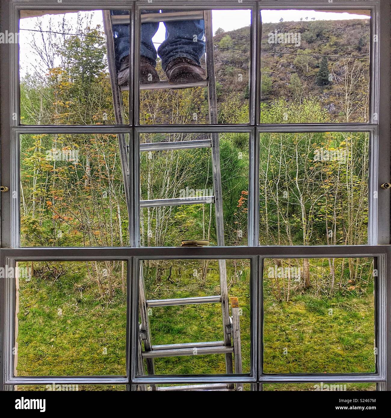 Window cleaner - Smartphone Captured Stock Image
