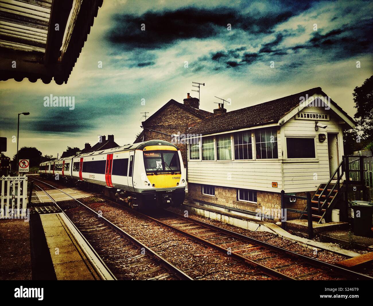 Wooden signal box on the East Suffolk branch line, Saxmundham, Suffolk, England. - Smartphone Captured Stock Image