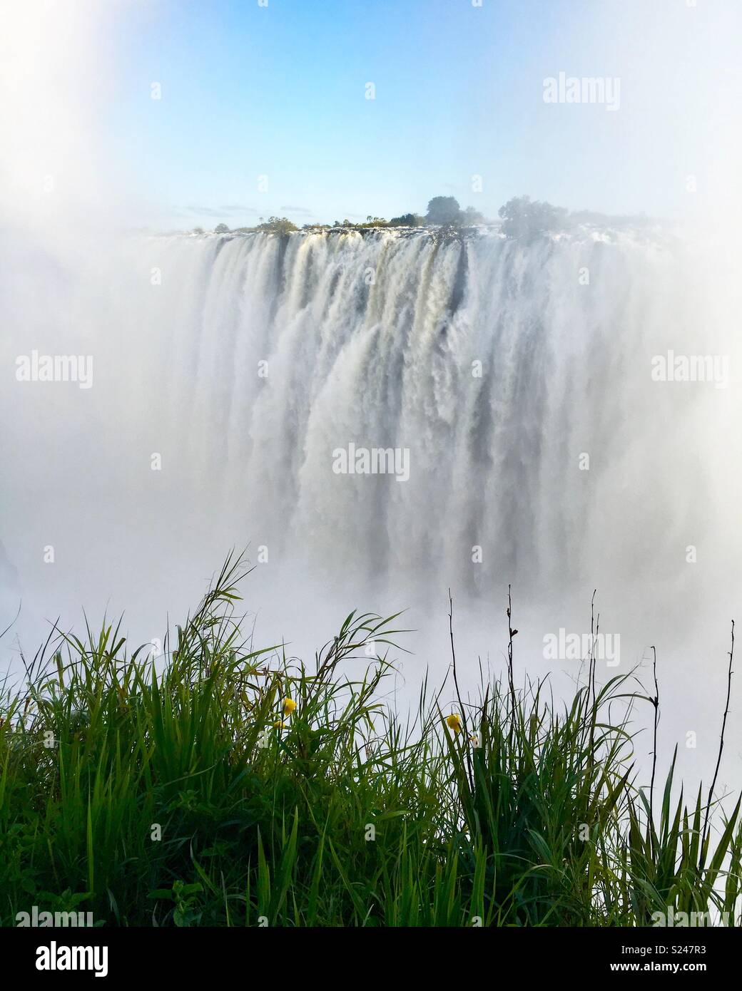 Victoria Falls on the Zambezi River on the border between Zimbabwe and Zambia. Stock Photo
