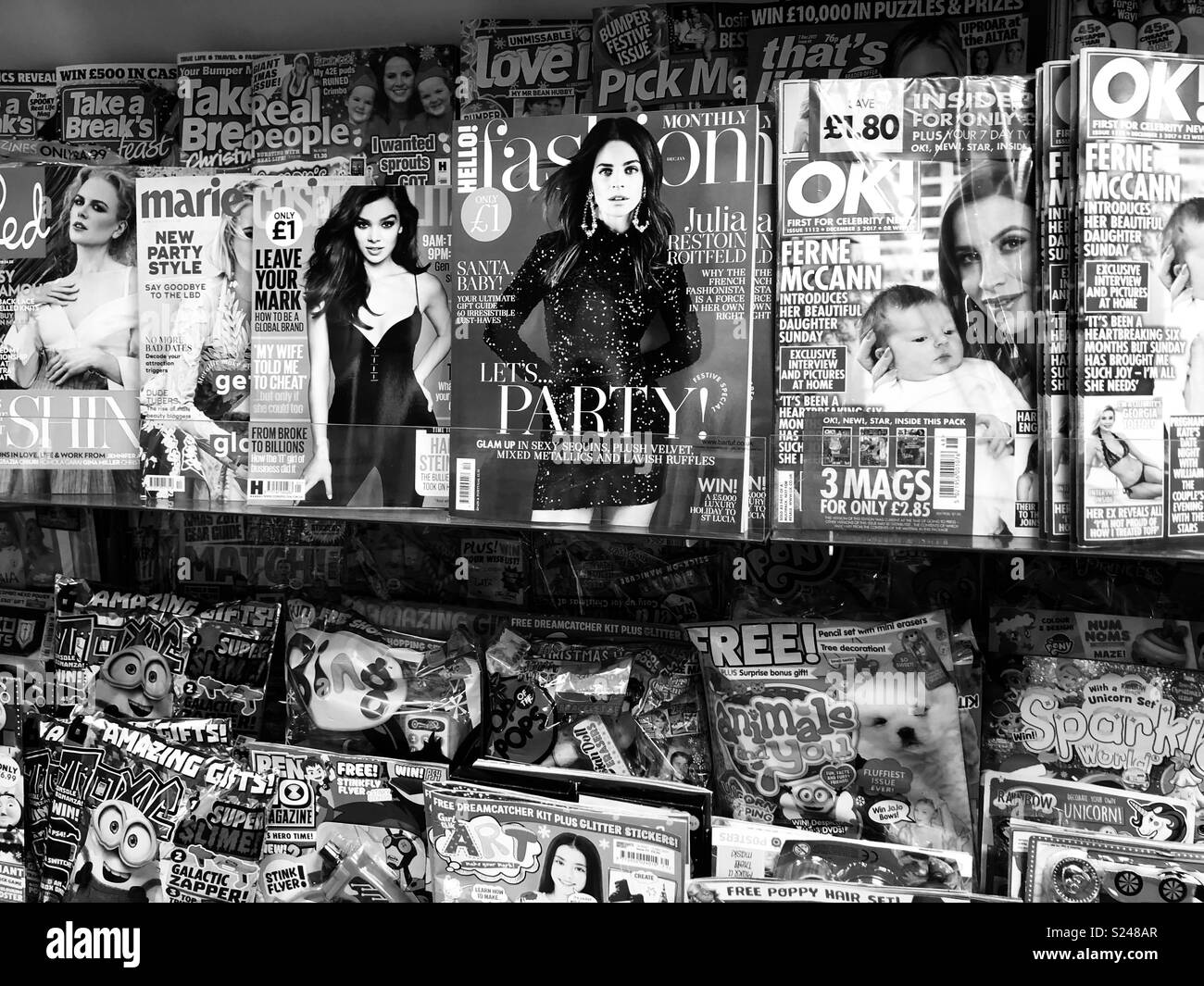Display of magazines on shelf Stock Photo