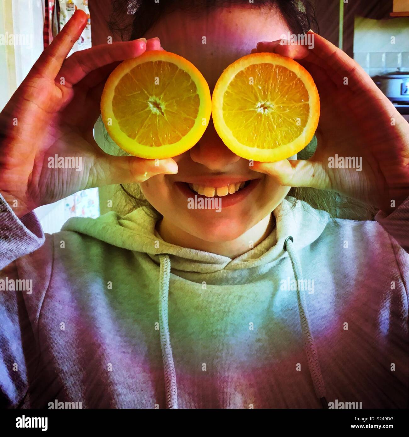 Child’s face with orange eyes - Smartphone Captured Stock Image