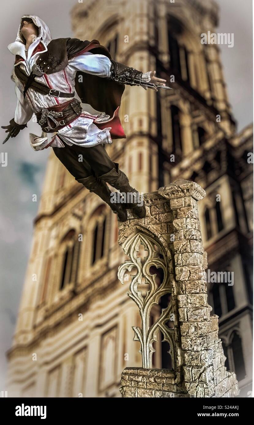 Assassins Creed Ezio Auditore De Firenze leap of faith off a building Stock Photo