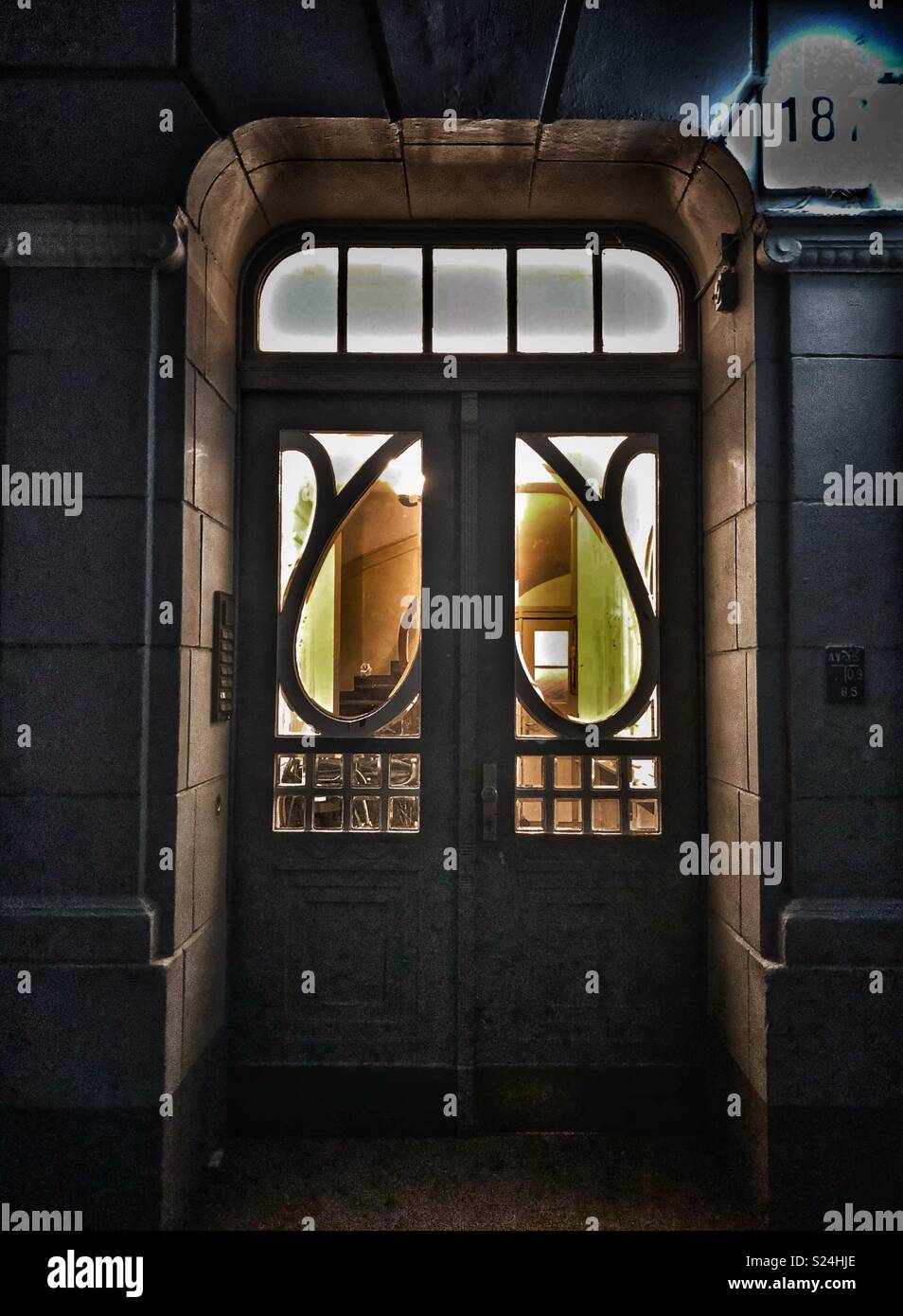 Unique entrance door design of an old historic building in Hamburg, Germany. - Smartphone Captured Stock Image