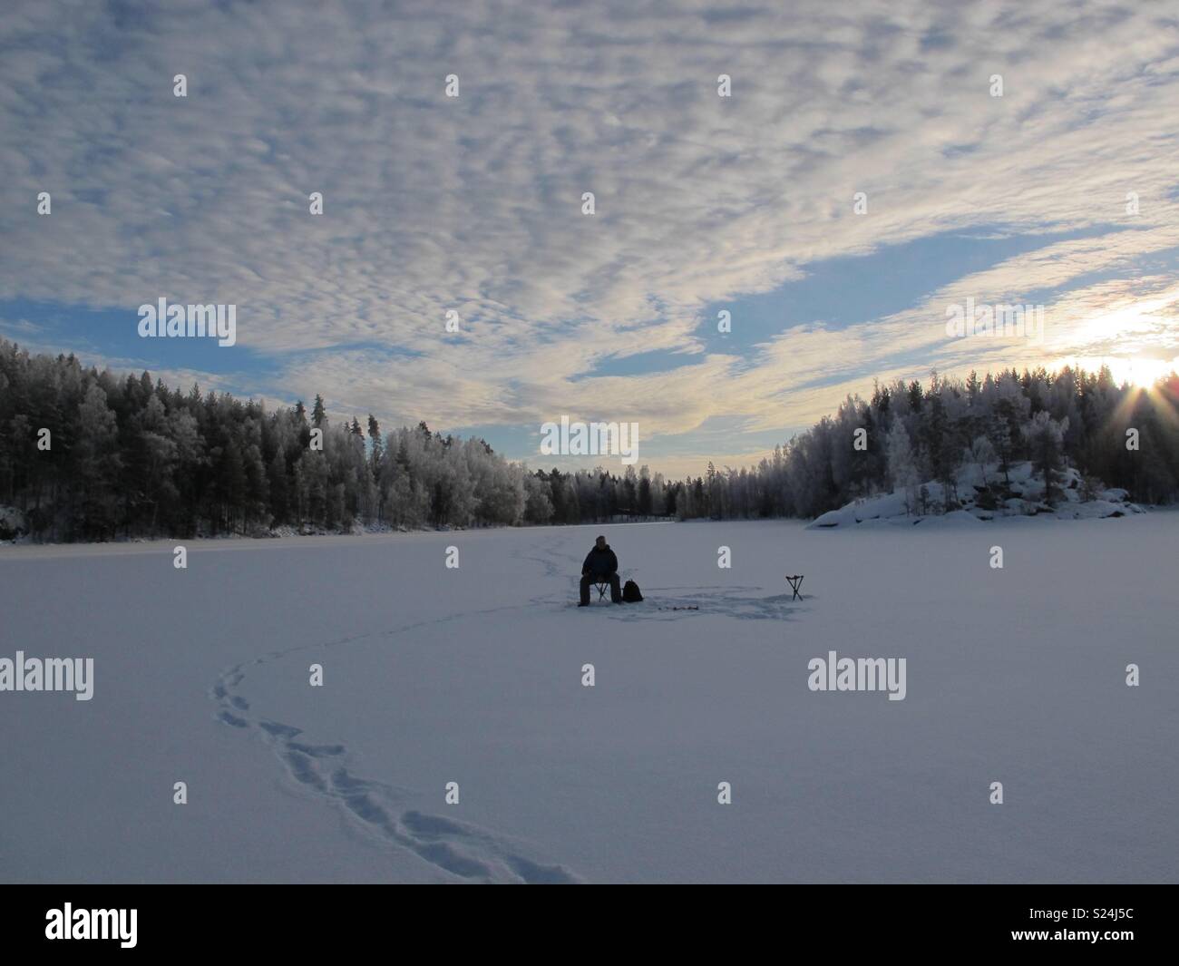 Ice Fishing Finland Stock Photo Alamy ice-fishing-finland-stock-photo-alamy