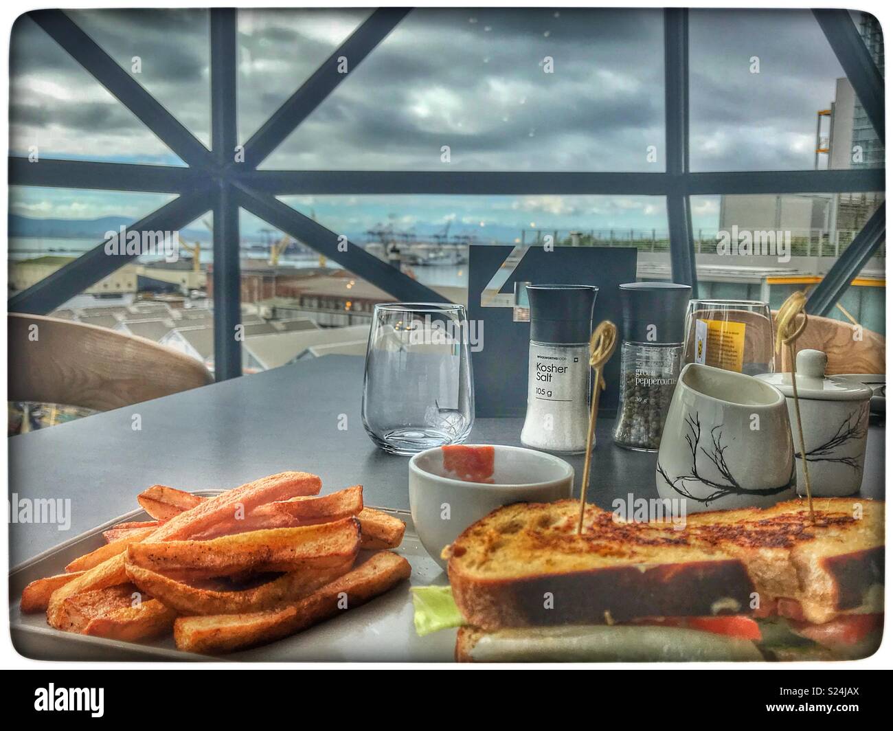 The newly opened Zeitz MOCAA Food restaurant and bar in the Zeitz Museum, Cape Town, South Africa with its iconic bubble windows. - Smartphone Captured Stock Image