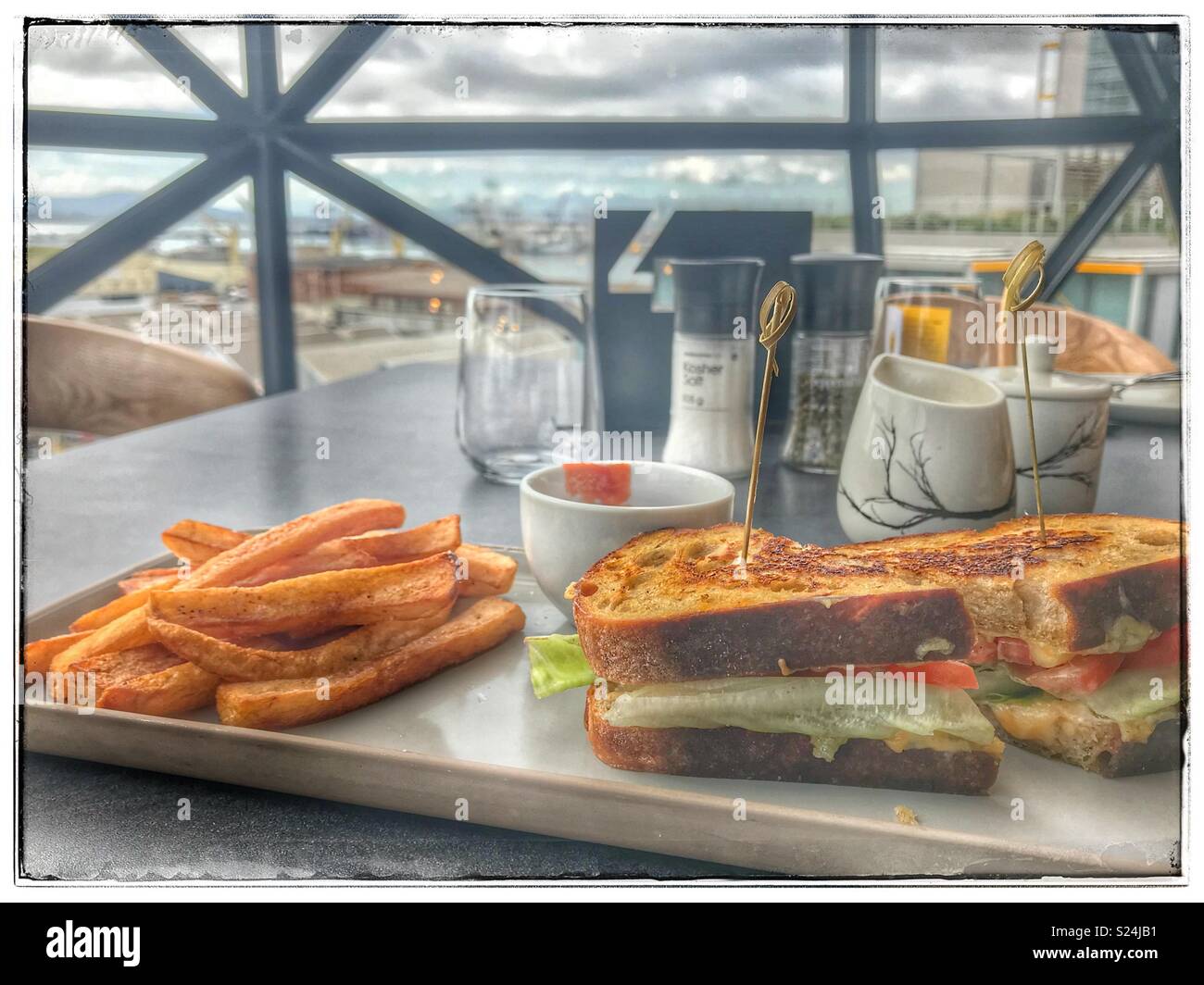 The newly opened Zeitz MOCAA Food restaurant and bar in the Zeitz Museum, Cape Town, South Africa with its iconic bubble windows. - Smartphone Captured Stock Image