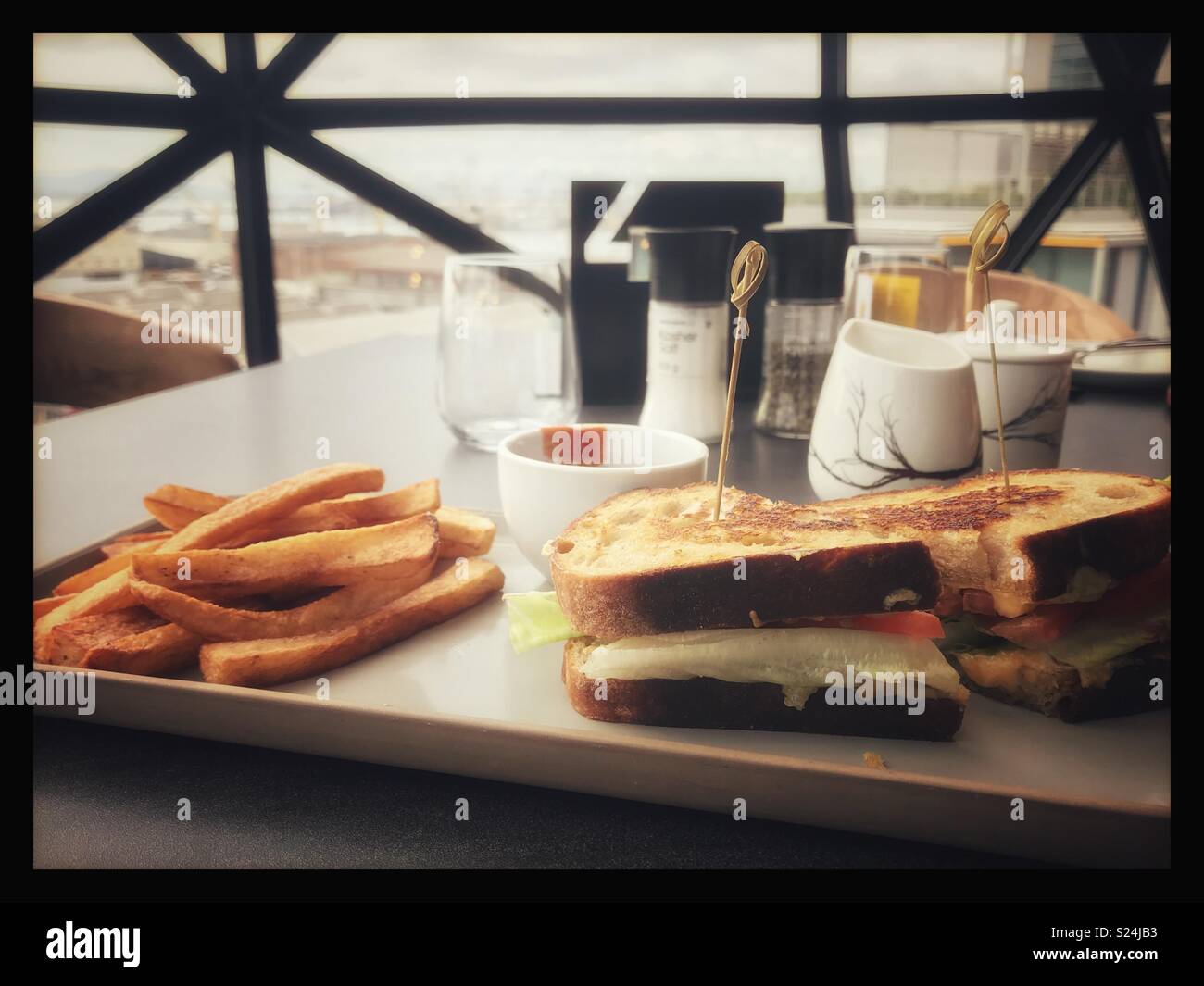 The newly opened Zeitz MOCAA Food restaurant and bar in the Zeitz Museum, Cape Town, South Africa with its iconic bubble windows. - Smartphone Captured Stock Image