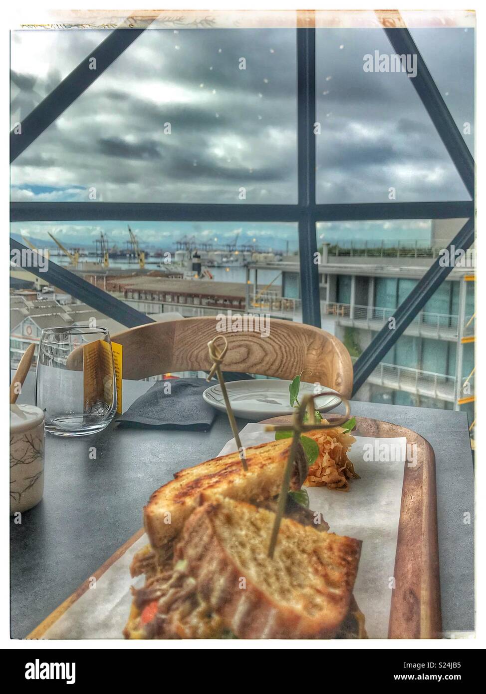The newly opened Zeitz MOCAA Food restaurant and bar in the Zeitz Museum, Cape Town, South Africa with its iconic bubble windows. - Smartphone Captured Stock Image