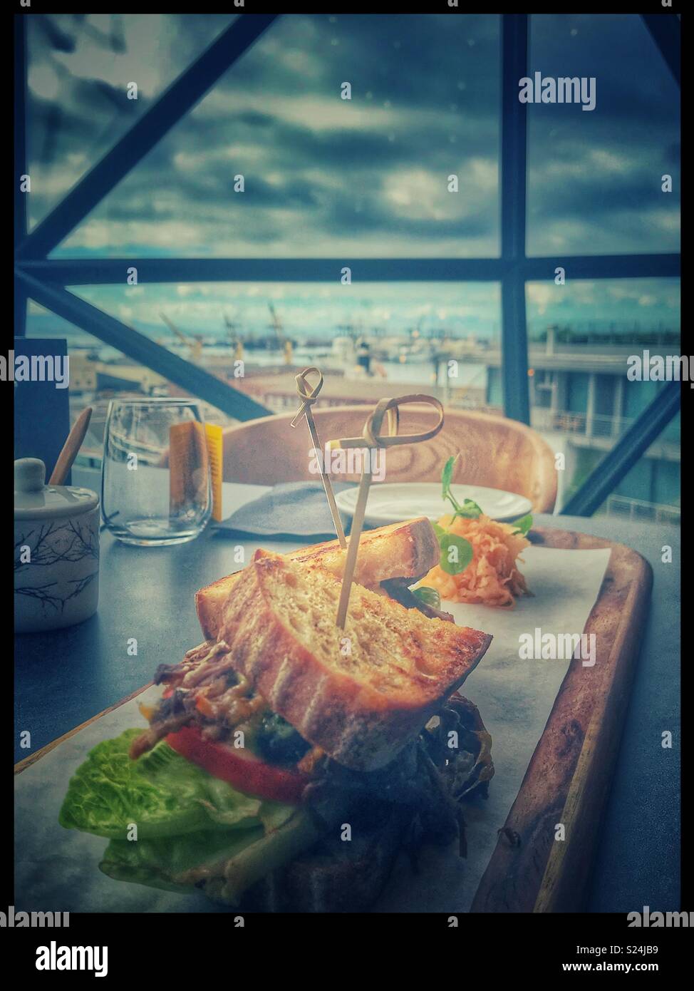 The newly opened Zeitz MOCAA Food restaurant and bar in the Zeitz Museum, Cape Town, South Africa with its iconic bubble windows. - Smartphone Captured Stock Image