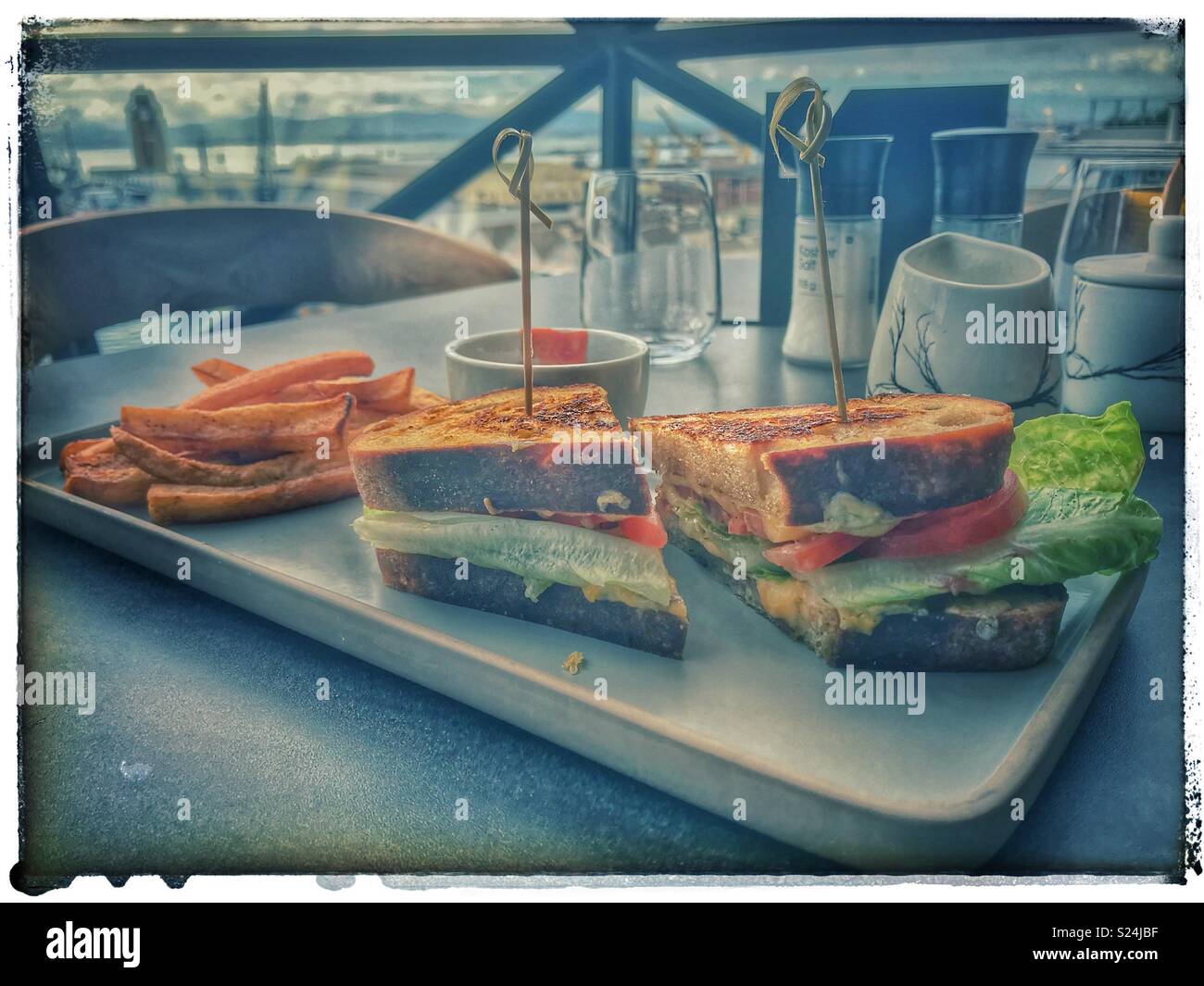 The newly opened Zeitz MOCAA Food restaurant and bar in the Zeitz Museum, Cape Town, South Africa with its iconic bubble windows. - Smartphone Captured Stock Image