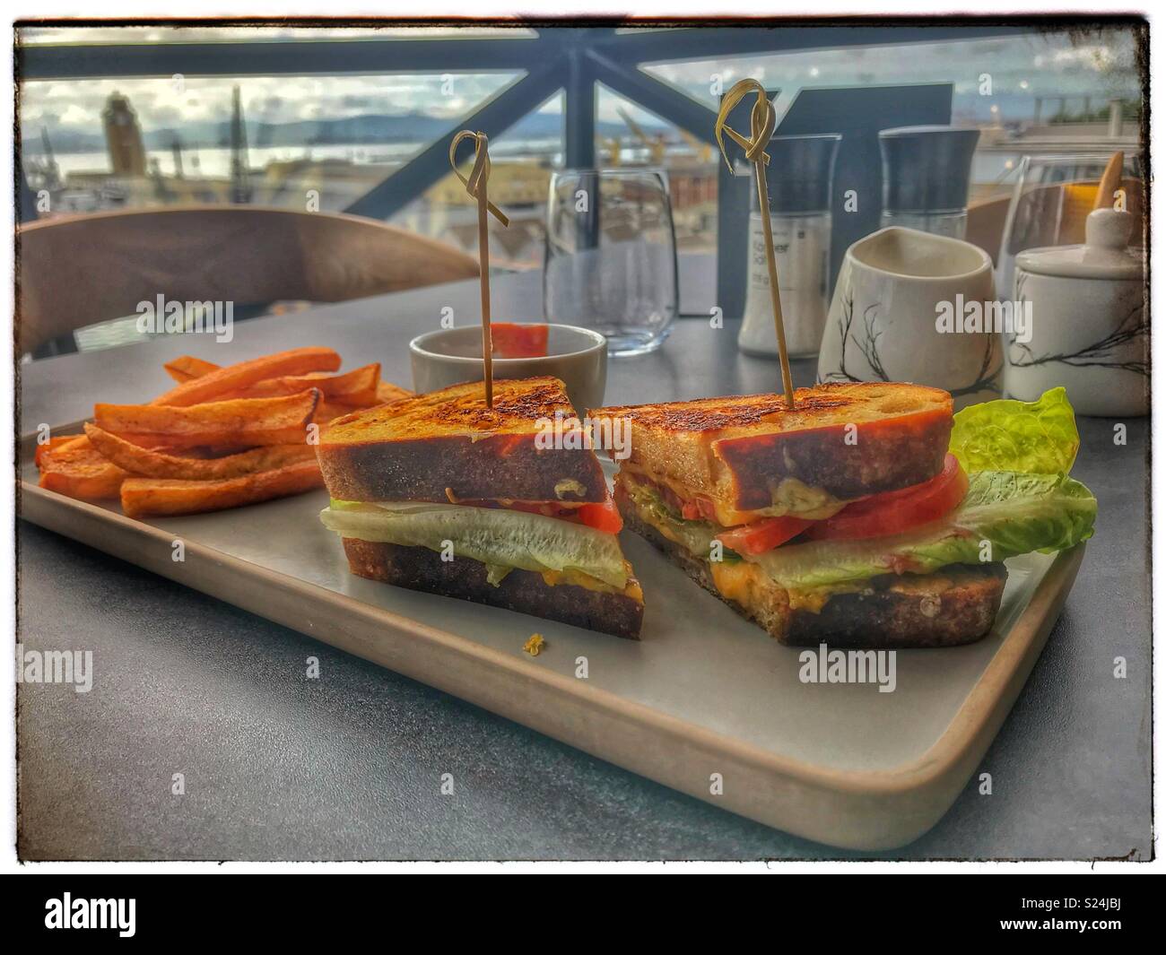 The newly opened Zeitz MOCAA Food restaurant and bar in the Zeitz Museum, Cape Town, South Africa with its iconic bubble windows. - Smartphone Captured Stock Image