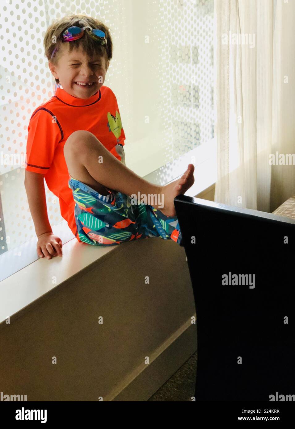 Happy boy in swimsuit Stock Photo
