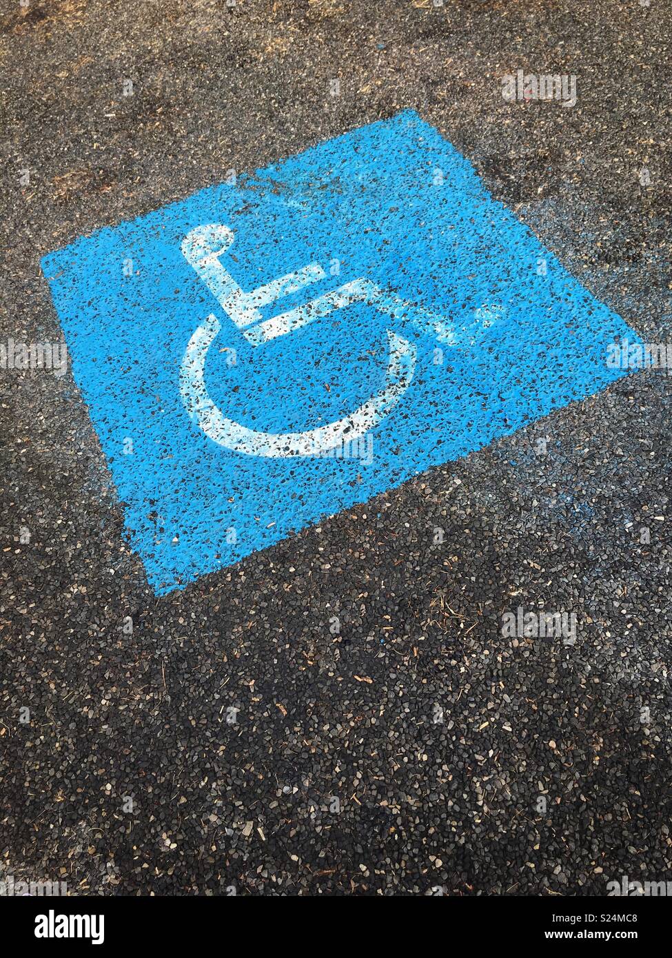 Disabled parking sign painted on the ground Stock Photo Alamy