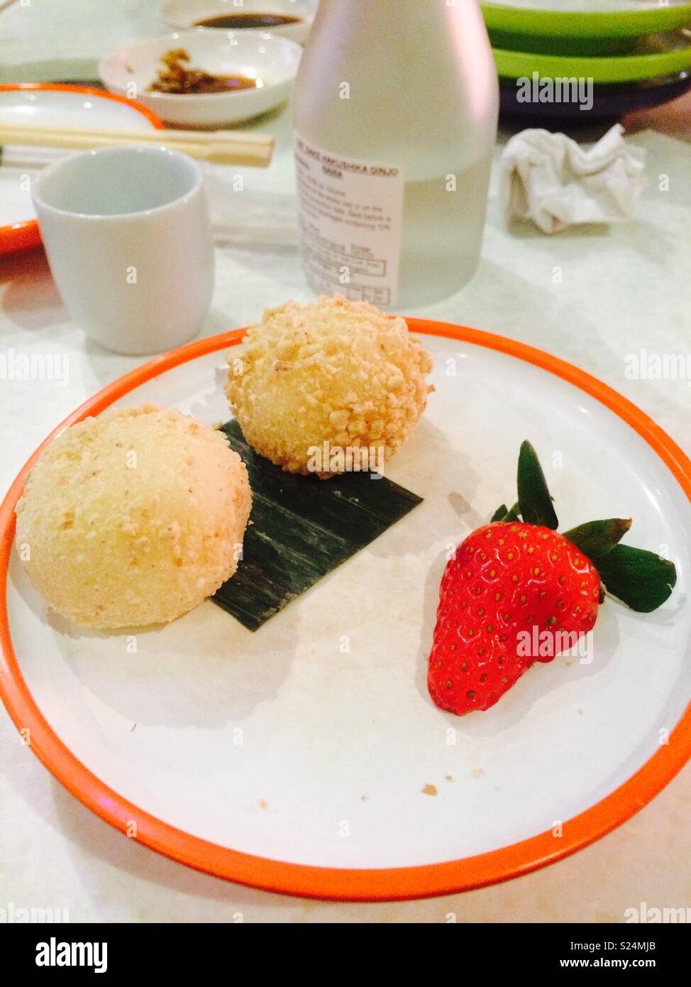Japanese mochi dessert with sake. Stock Photo