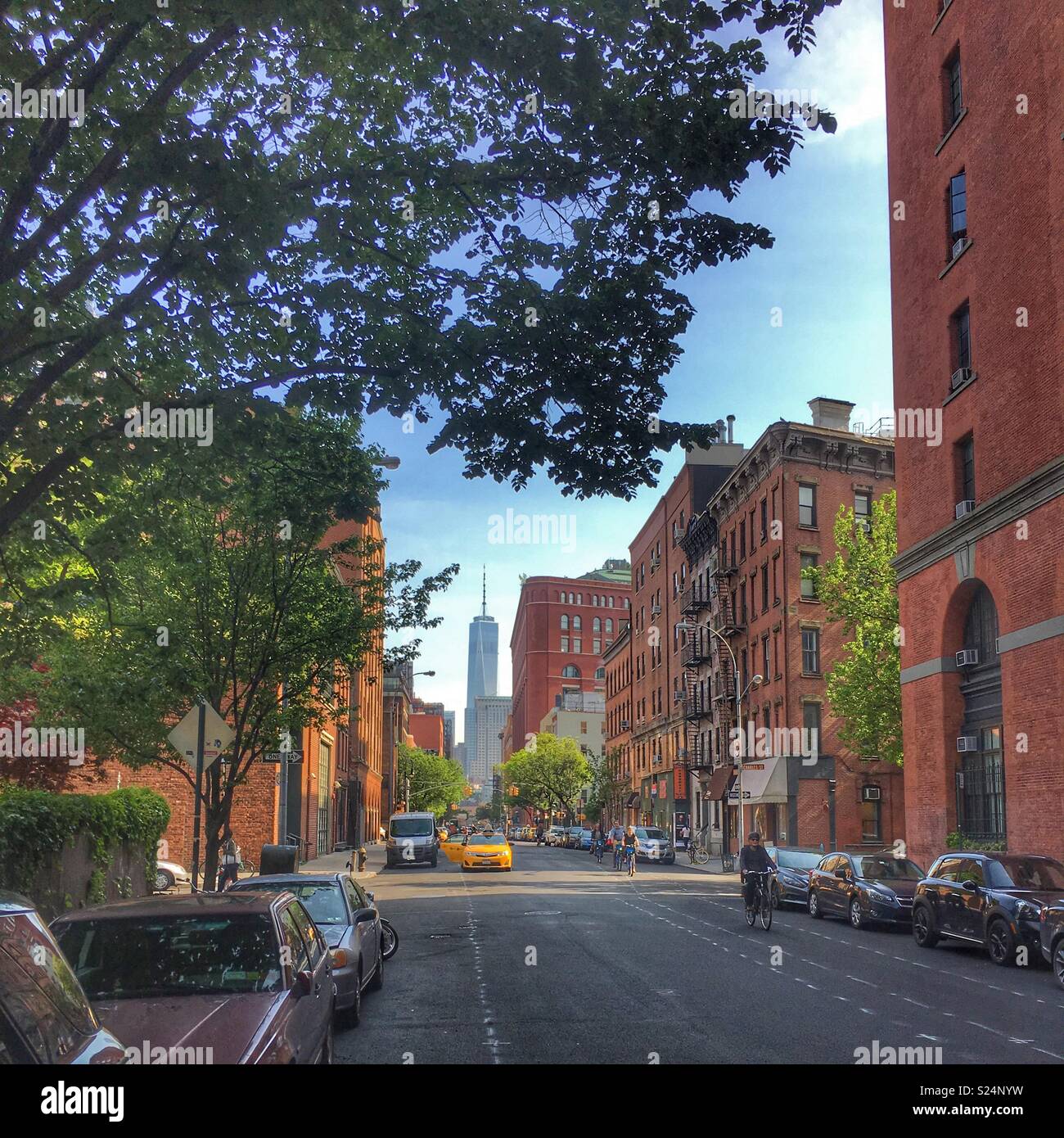 Lower Manhattan street view with wtc in background Stock Photo Alamy