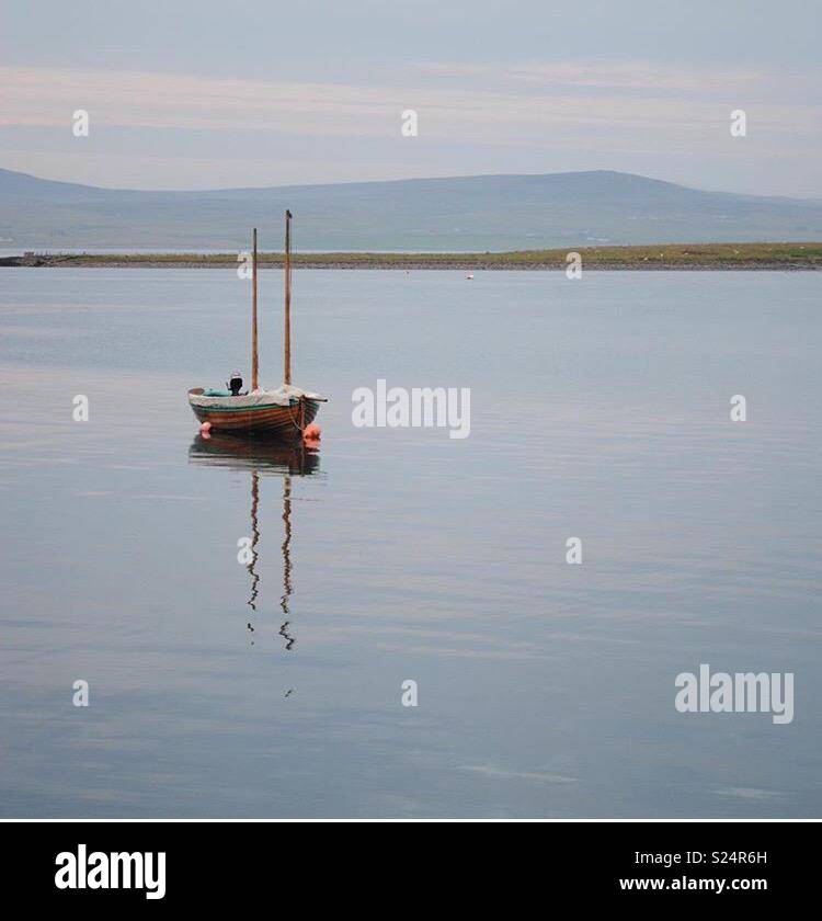 Tranquil harbour in Orkney Stock Photo