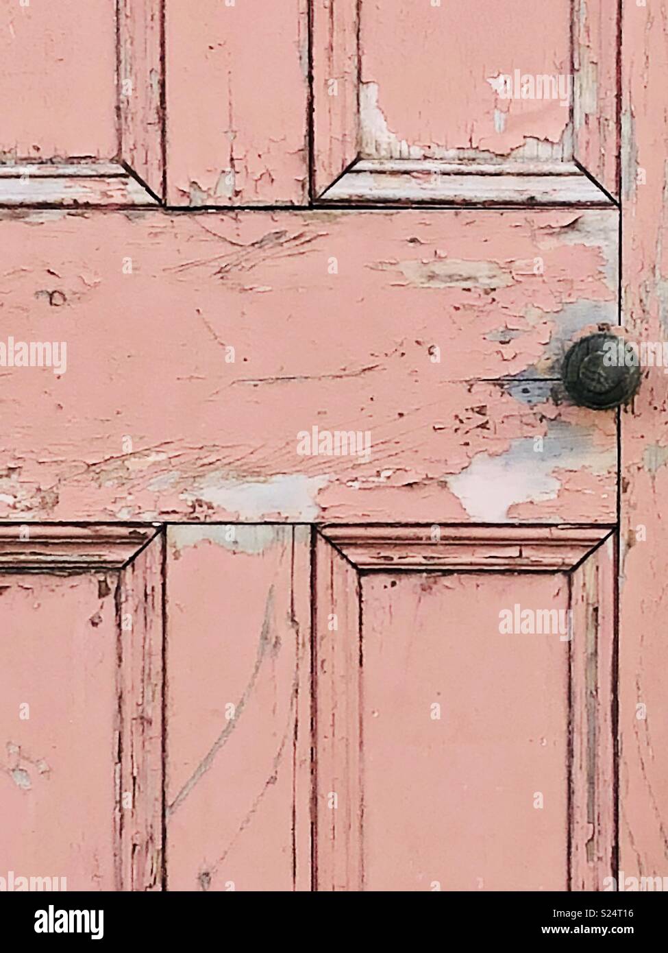 Pink wooden door with flaking paint Stock Photo Alamy