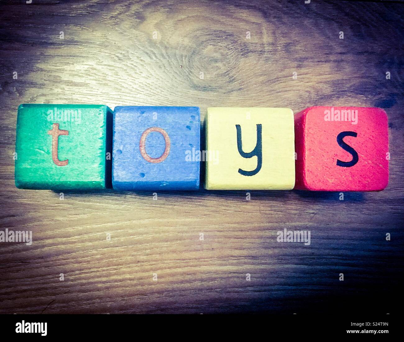 Letter blocks spelling toys Stock Photo