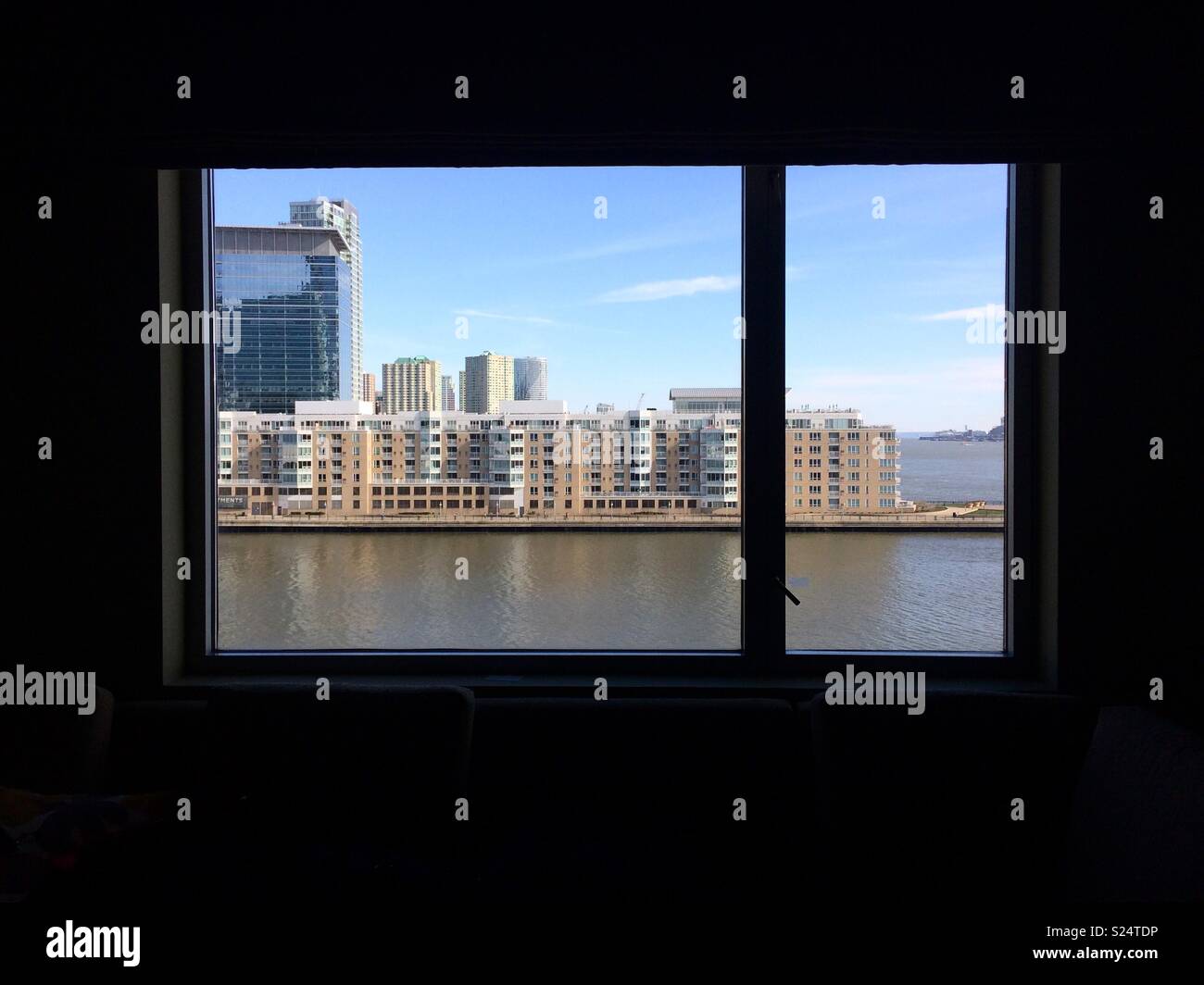 Looking through the window in a guest room at the Hyatt Regency Jersey City on the Hudson, Jersey City, New Jersey - Smartphone Captured Stock Image
