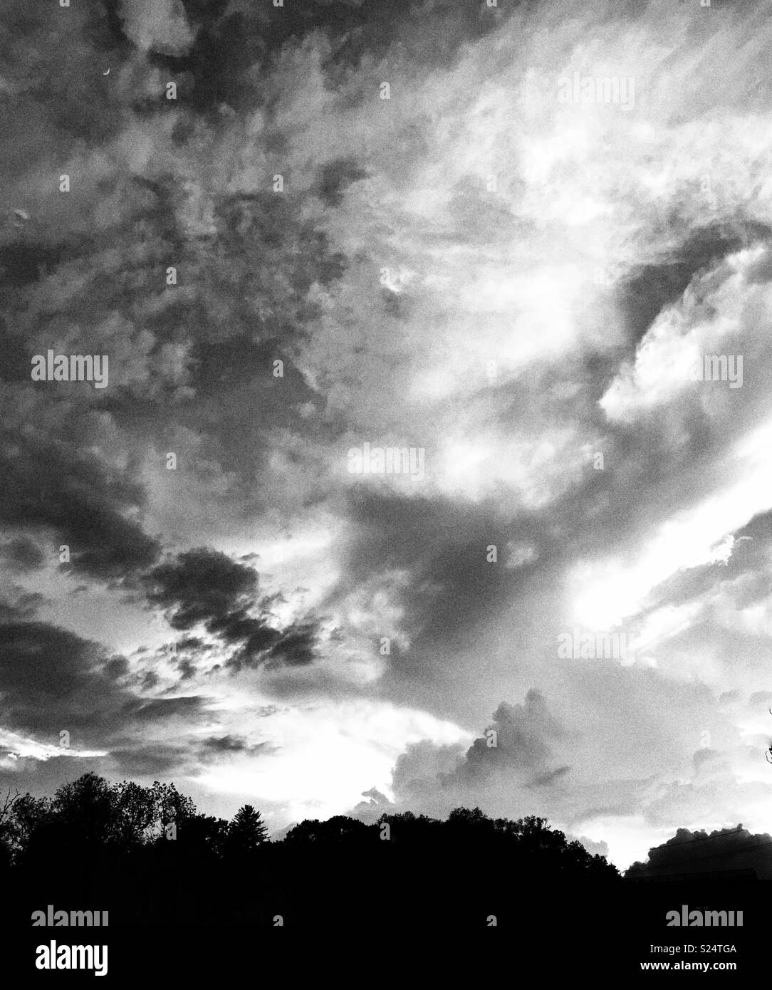 A black and white image of dramatic clouds Stock Photo - Alamy