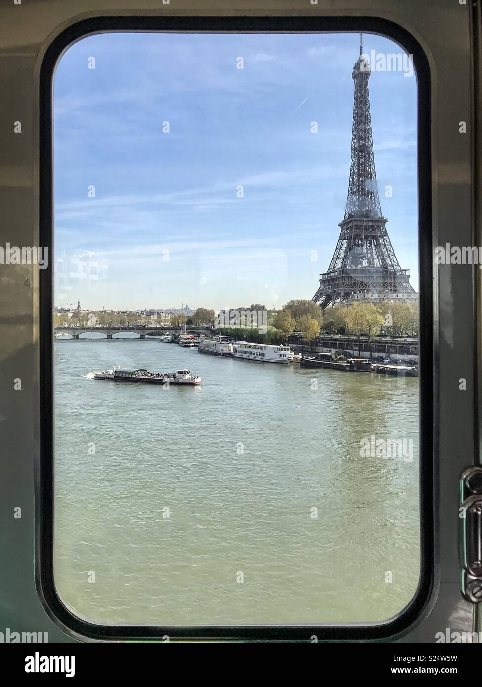 The Eiffel Tower seen from a window of the metropolitan train - Smartphone Captured Stock Image