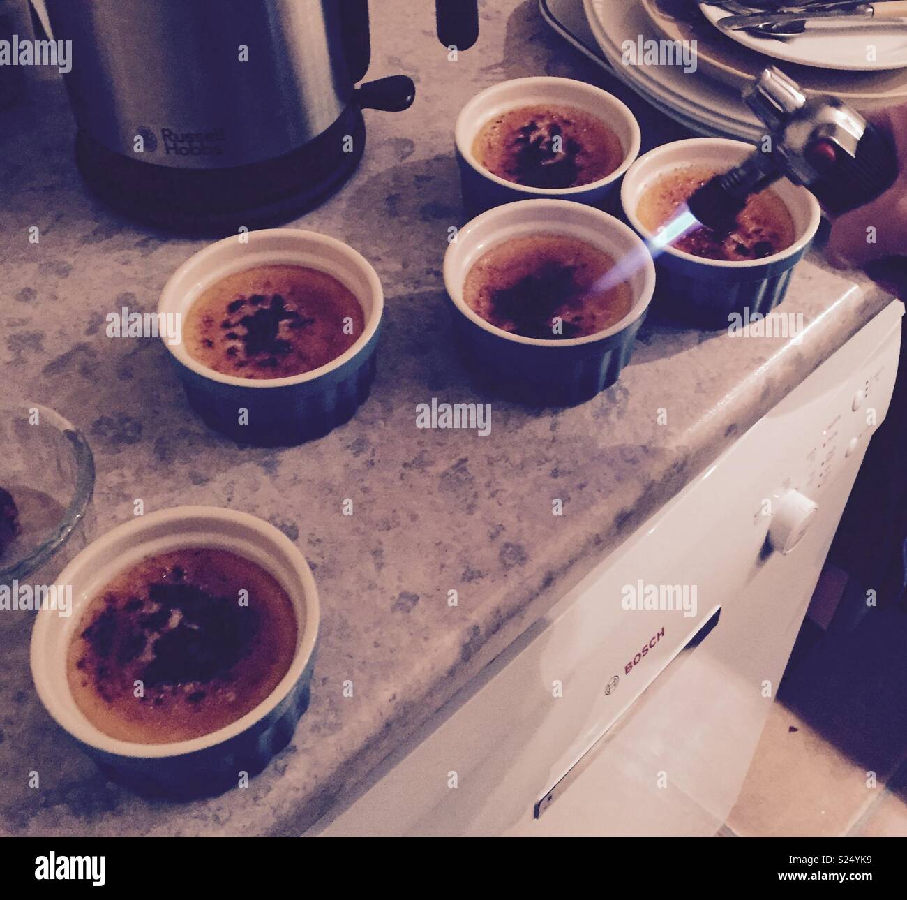 Making creme brûlée - Smartphone Captured Stock Image