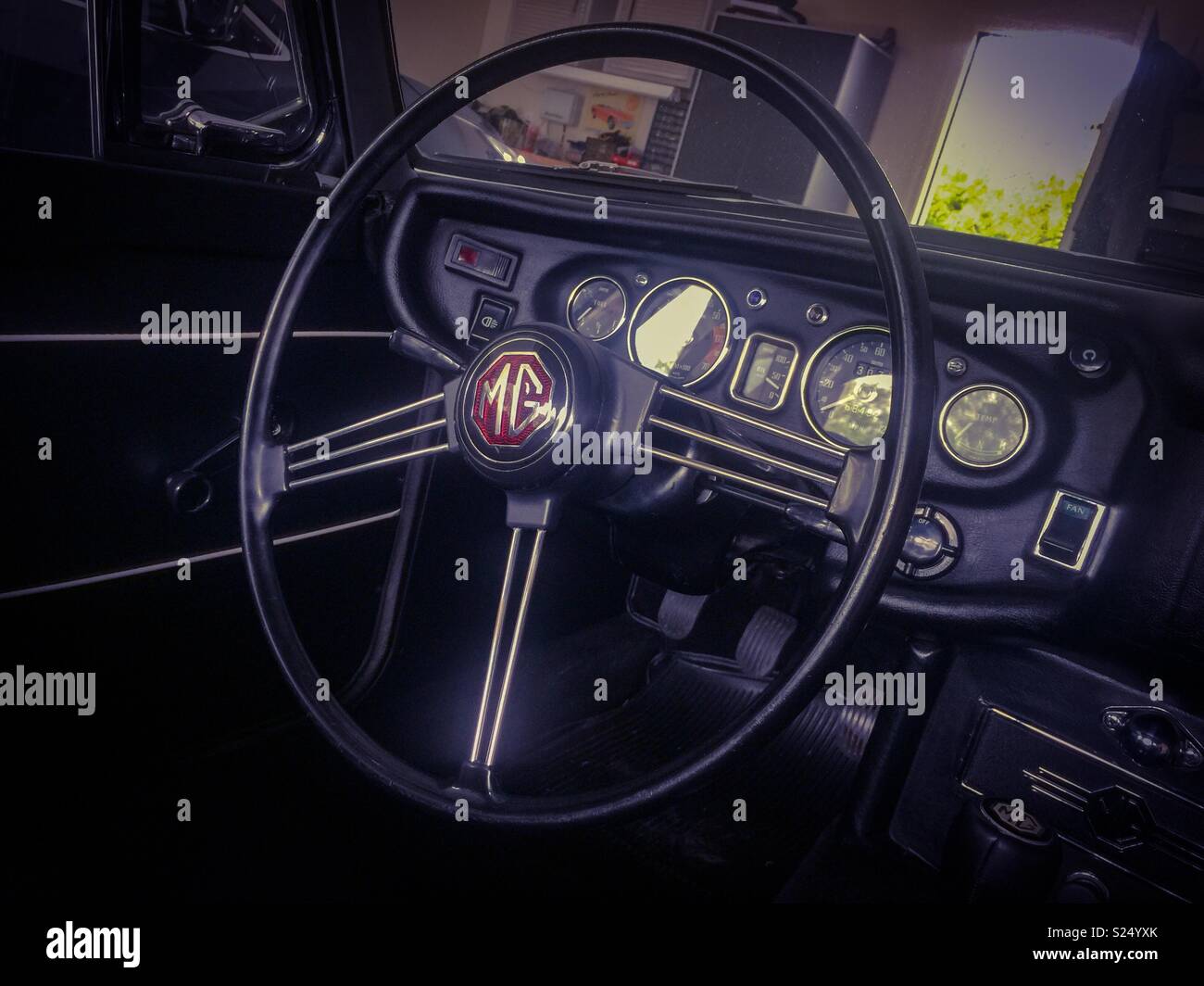 Classic MG banjo steering wheel - Smartphone Captured Stock Image