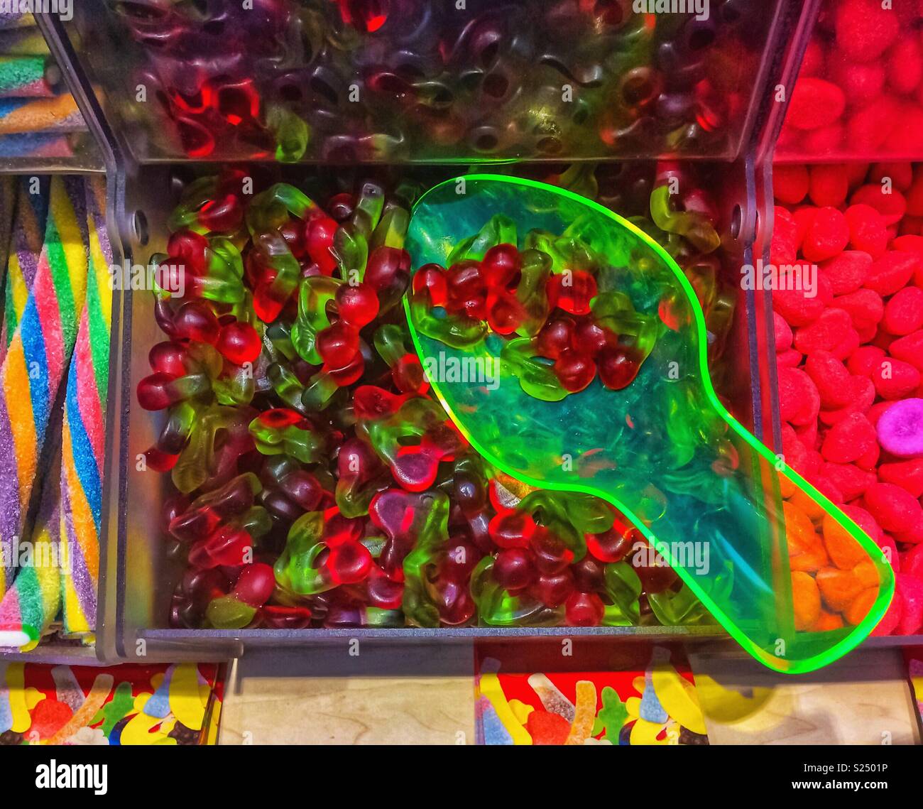 Closeup of colorful candy on sale displayed in a shop, France. - Smartphone Captured Stock Image