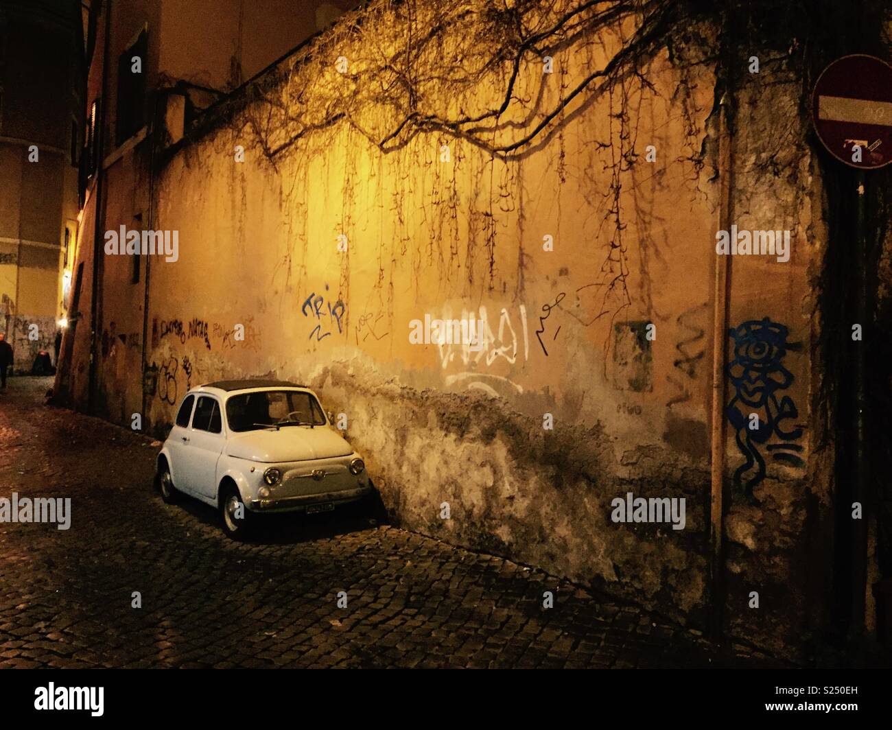 Fiat 500 parked against wall - Smartphone Captured Stock Image