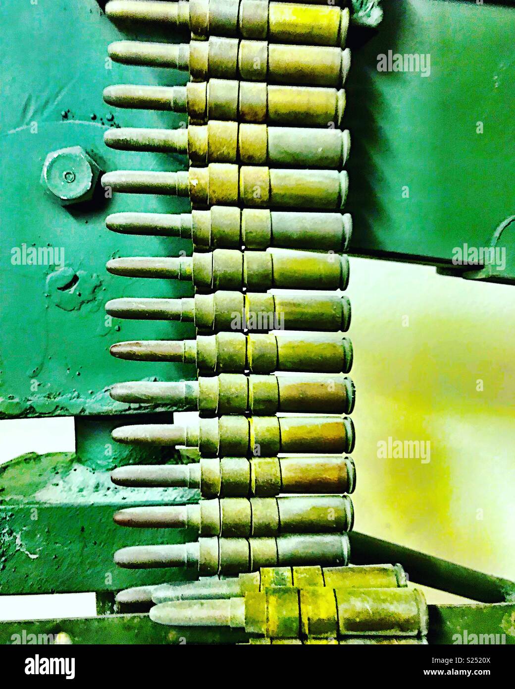 A machine gun clip of bullets loaded into a machine gun Stock Photo Alamy