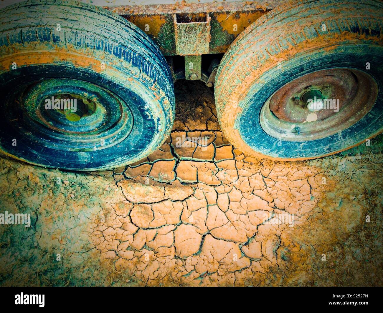 Cracked and drying mud with trailer tires Stock Photo Alamy